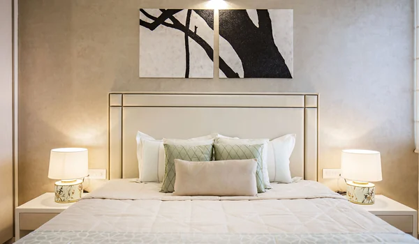 Gallery master bedroom interior with vitrified tile flooring